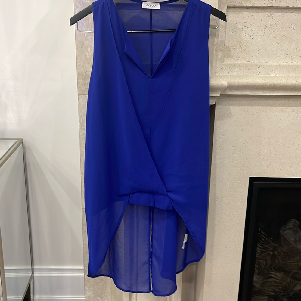 Royal Blue high low criss cross tank blouse. One size small/medium. Worn once.